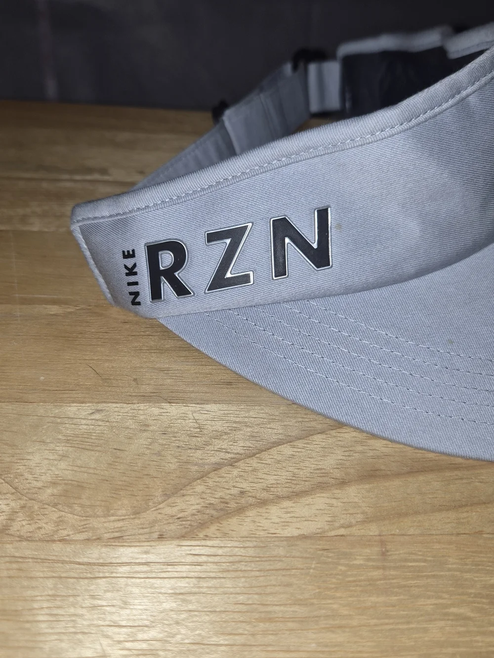 Nike Men’s Gray Visor with Black Swoosh